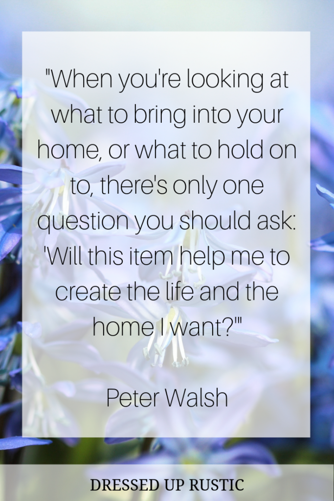 Quote by Peter Walsh about organization, overlaying a close up of blue flowers. The quote is meant to motivate and inspire you to create an organized home and declutter your spaces.