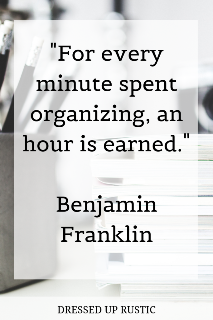 Practical Quote by Benjamin Franklin layered over a black and white image of a box of pencils and a stack of notebooks. The quote is meant to motivate and inspire you to create an organized home and declutter your spaces.