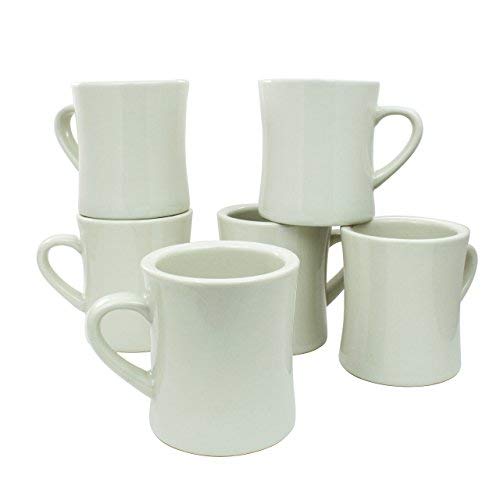 A stack of vintage farmhouse coffee mugs in a sage green or off white