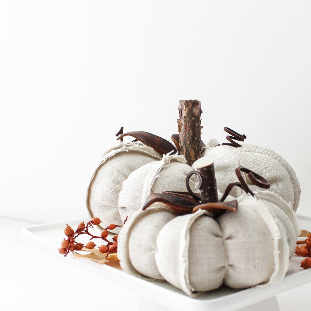 white fabric pumpkins centerpiece