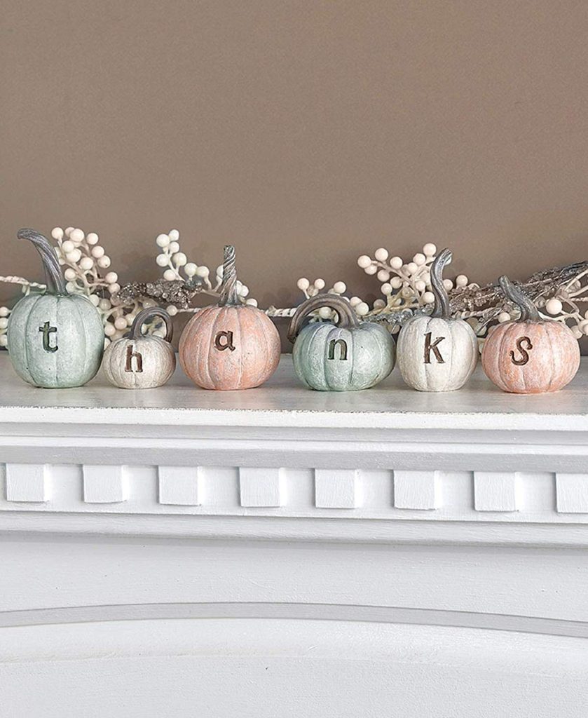 The soft colors on these pumpkins spelling the word "thanks" would work wonderfully as fall farmhouse decor.