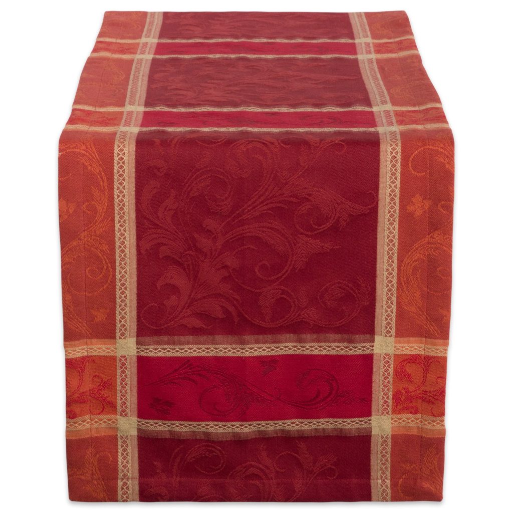 A cranberry colored table runner for Thanksgiving or Christmas and fall farmhouse decor