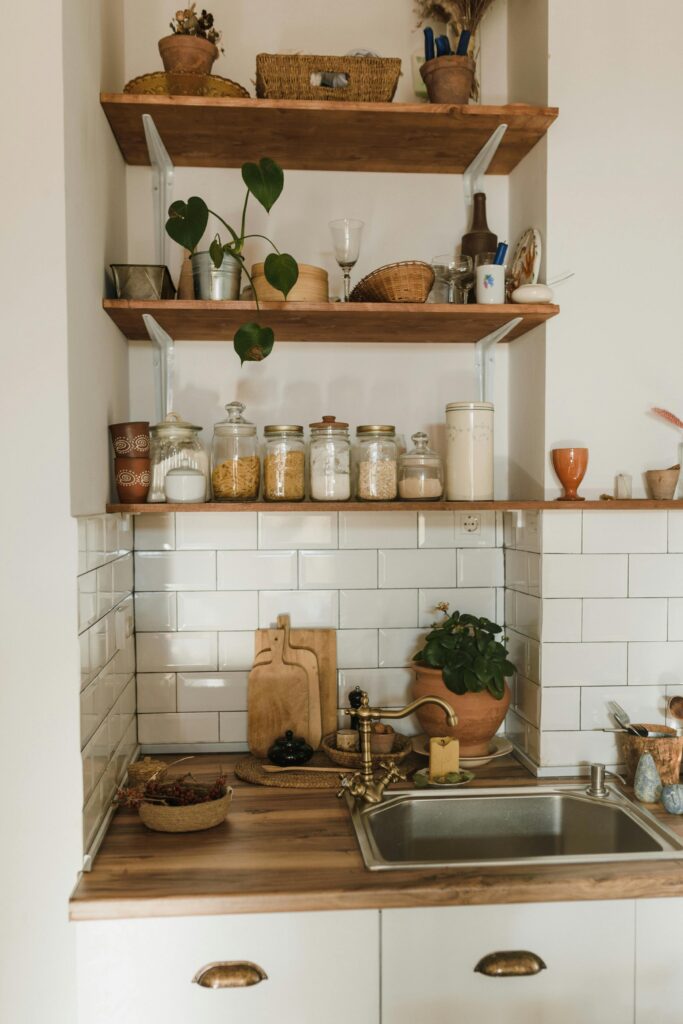 open shelving with jars and spices in a farmhouse kitchen