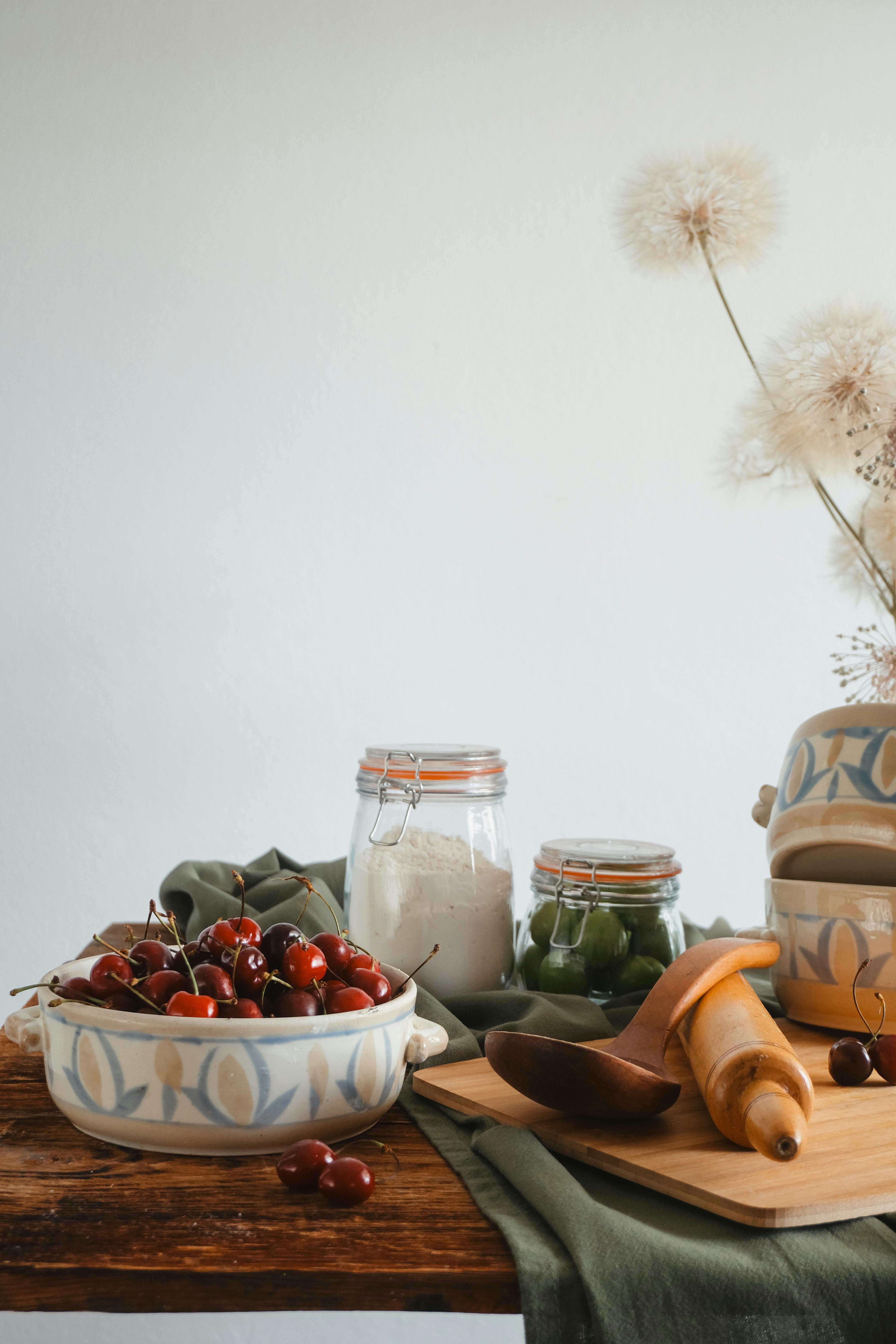 ceramic dishes on a farmhouse table in a farmhouse kitchen