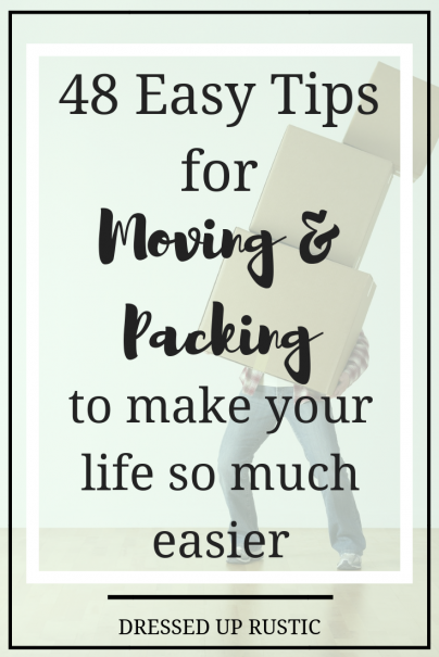 The words 48 Tips for Moving and Packing by Janette Foreman at Dressed Up Rustic in front of a man struggling to hold a tall stack of cardboard boxes.