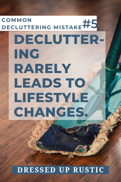 a close up of a mop on a wood floor behind a quote about decluttering.